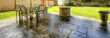 Photo for Stamped concrete patio sealed with a high gloss, wet look concrete sealer by Ghostshield concrete sealers